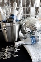 Konfettikanone Champagnerflasche silber