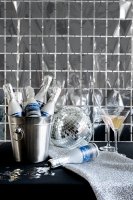 Konfettikanone Champagnerflasche silber