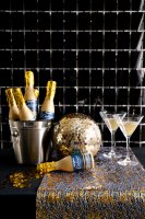 Konfettikanone Champagnerflasche gold